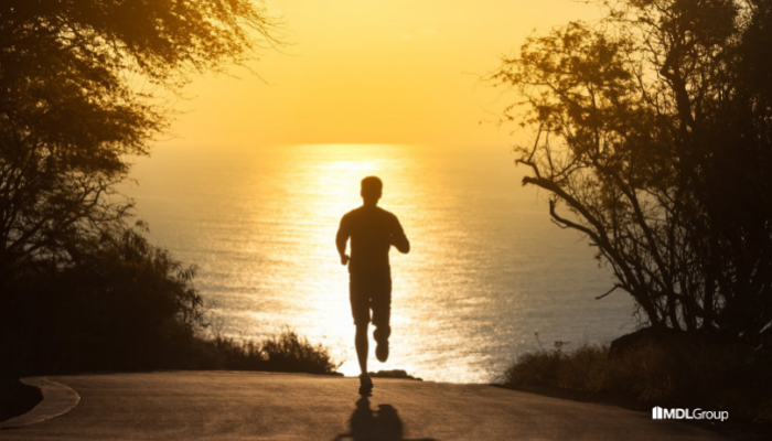 Man deciding to run into the sunset